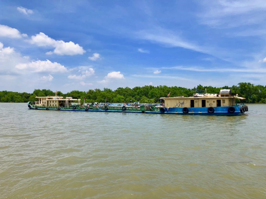The barge is a working horse of the Saigon River